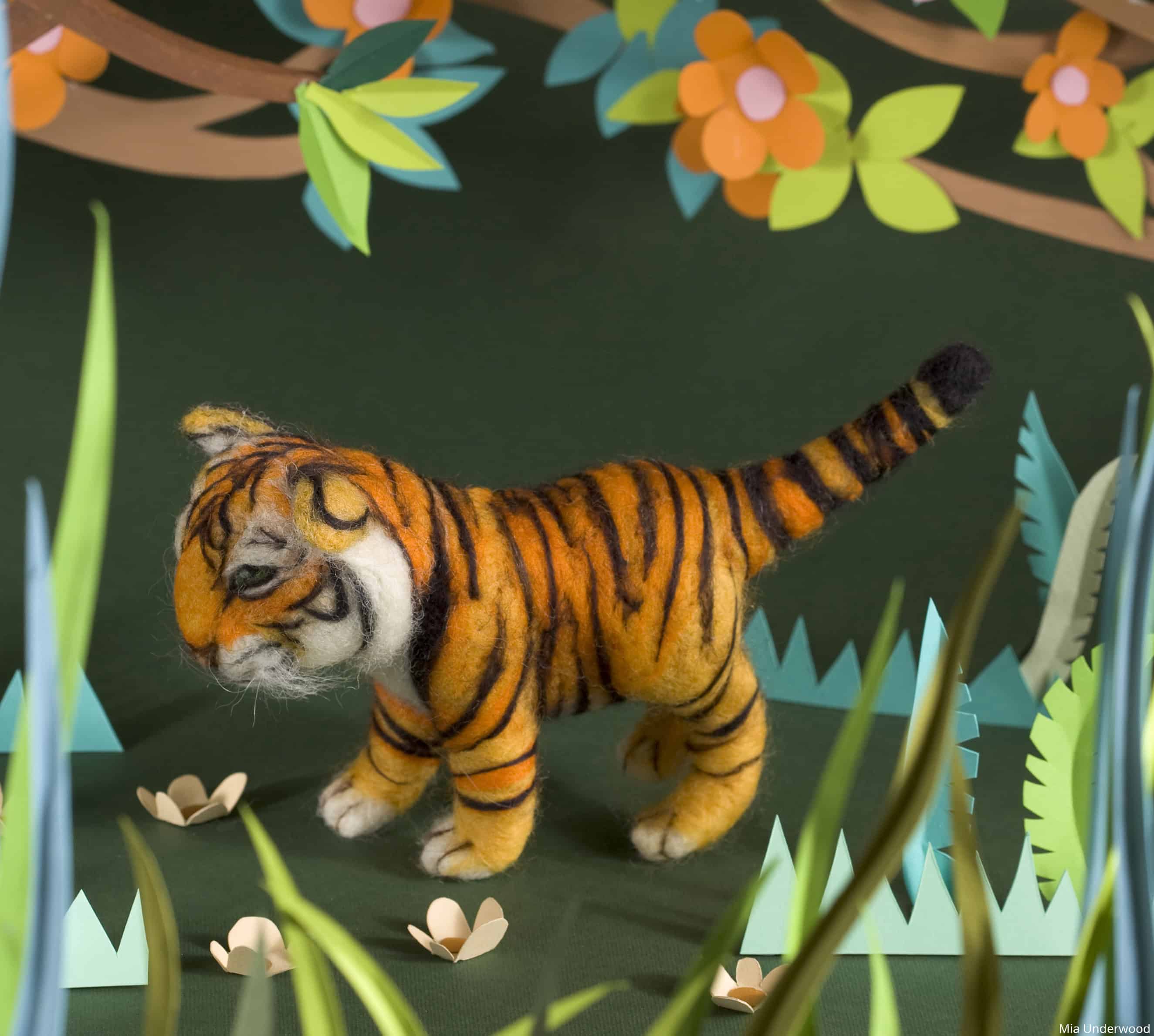 3D needle felted model of a tiger in a jungle scene